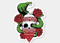 a skull and snake with roses and a bandana on a sticker